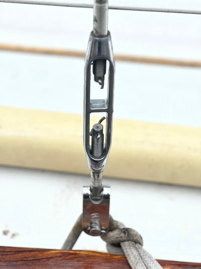 Slide: The Image of Close-up of a turnbuckle on a 1977 Van De Stadt Rebel 42 sailboat. - 25