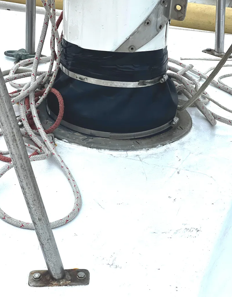 Slide: The Image of Close-up of a 1977 Van De Stadt Rebel 42 sailboat mast base with ropes. - 27