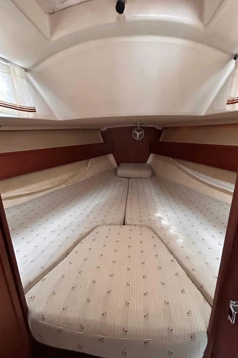 Slide: The Image of 1979 Sabre 28-2 sailboat interior cabin with V-berth bed - 34