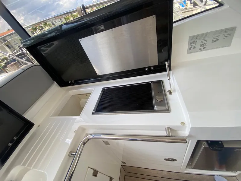 Slide: The Image of Outdoor kitchen area on 2014 Sunseeker 48 Portofino XPS yacht. - 18