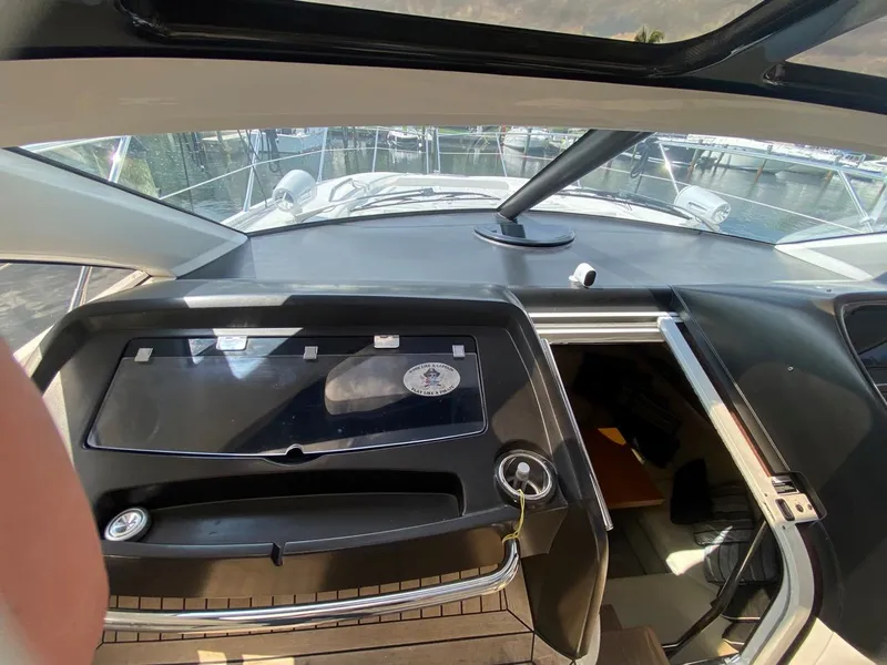 Slide: The Image of Interior view of 2014 Sunseeker 48 Portofino XPS yacht cockpit. - 28