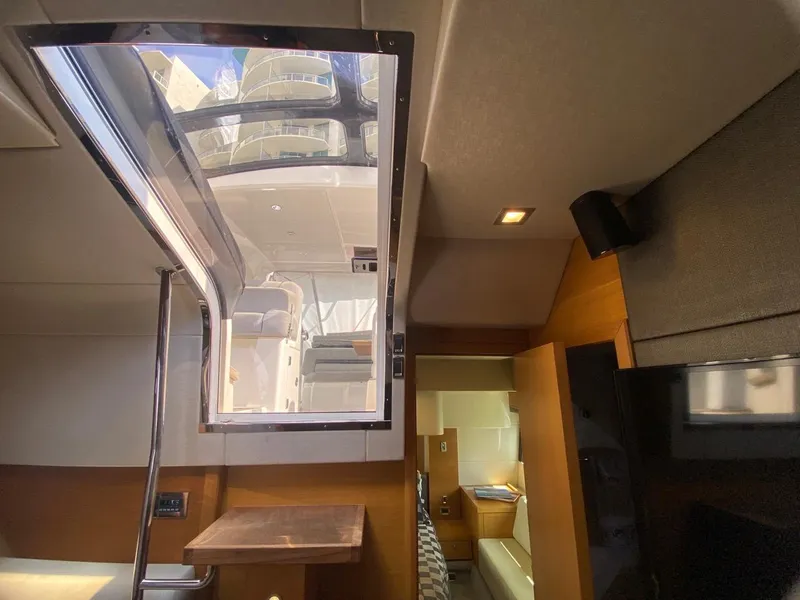 Slide: The Image of Interior view of 2014 Sunseeker 48 Portofino XPS yacht, featuring modern design and natural lighting. - 30