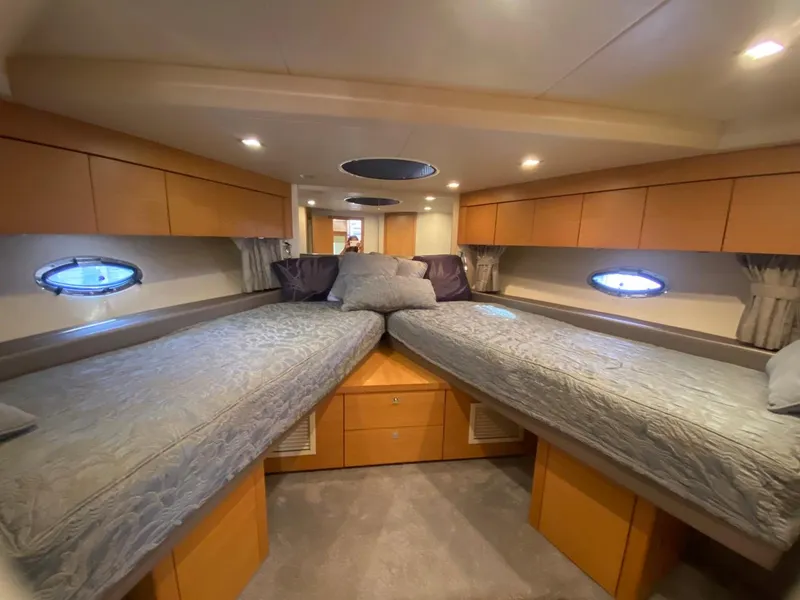 Slide: The Image of Interior cabin of 2014 Sunseeker 48 Portofino XPS yacht with twin beds and modern design. - 43