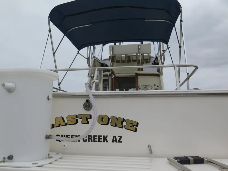 Slide: The Image of 1988 Blackman 26 Billfisher boat with canopy, named "Last One," Queen Creek, AZ. - 38