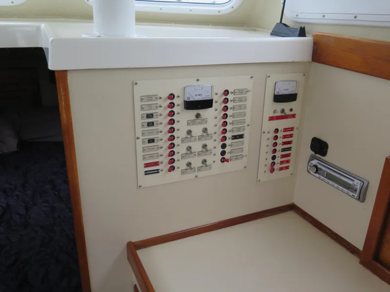 Slide: The Image of Control panel of a 1988 Blackman 26 Billfisher boat interior. - 9