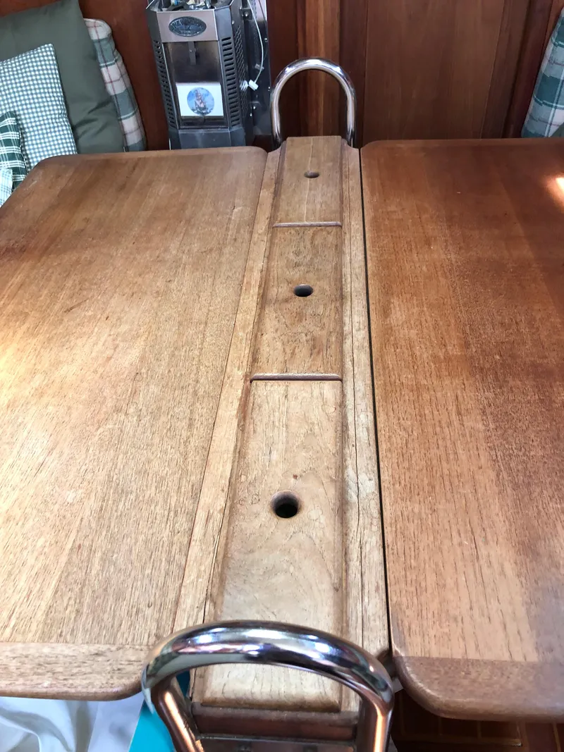 Slide: The Image of Wooden interior table on a 1986 Pacific Seacraft Crealock 34 sailboat. - 21