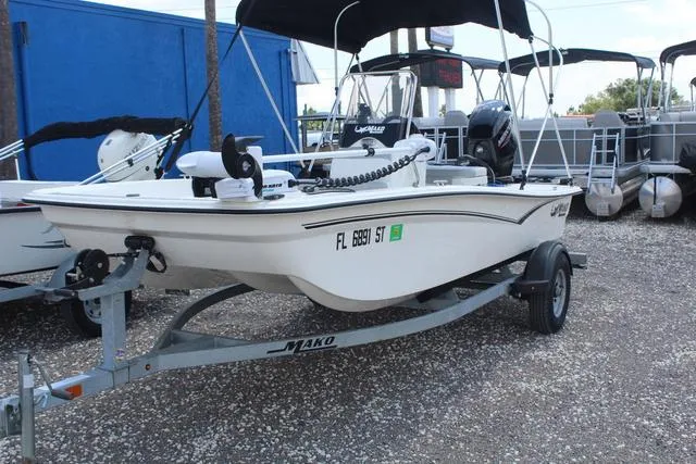 The Image of 2021 Mako Pro Skiff 15 CC on trailer, side view. - 1