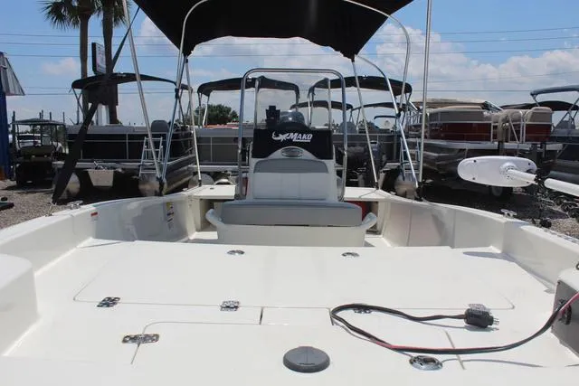 Slide: The Image of 2021 Mako Pro Skiff 15 CC boat with sunshade. - 11