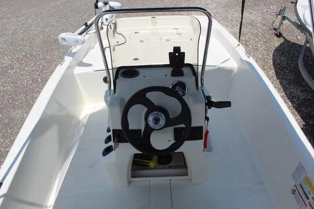 Slide: The Image of Interior view of a 2021 Mako Pro Skiff 15 CC boat. - 17