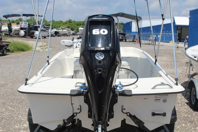 Slide: The Image of 2021 Mako Pro Skiff 15 CC with Mercury 60 engine, parked outdoors. - 7