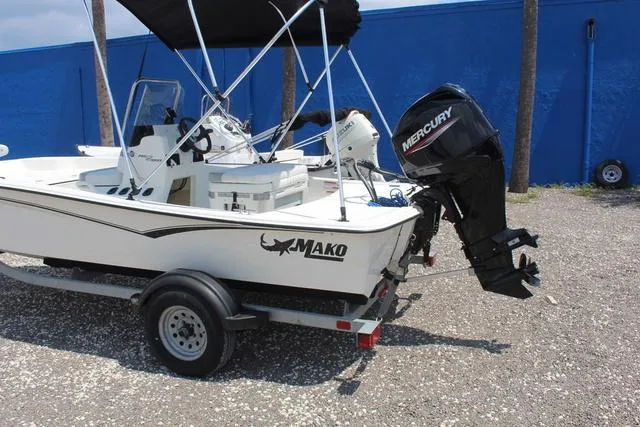 Slide: The Image of 2021 Mako Pro Skiff 15 CC with Mercury engine on trailer. - 8