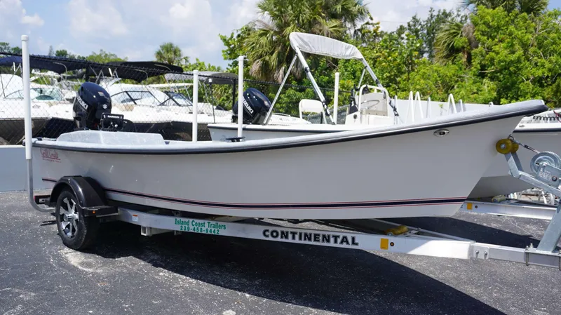 Slide: The Image of 2023 Griffis Fiberglass 16 Wide Side Console boat on Continental trailer. - 10