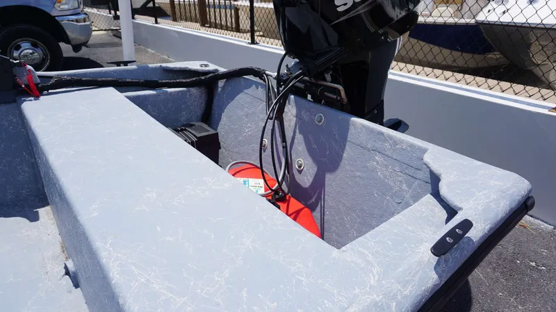 Slide: The Image of 2023 Griffis Fiberglass 16 Wide Side Console boat with motor and fuel tank. - 6