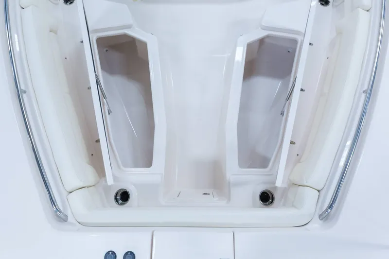 Slide: The Image of 2024 Grady-White Canyon 386 boat storage compartments and seating area. - 7