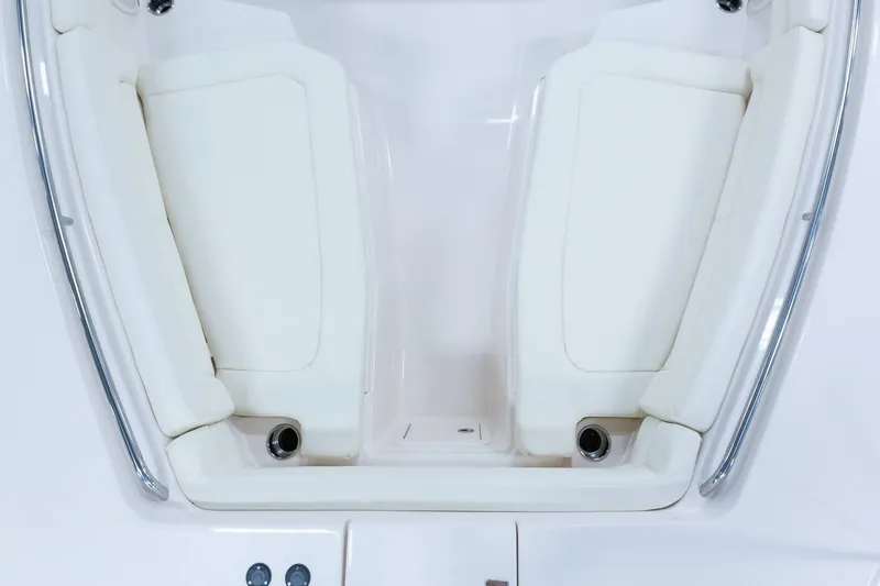 Slide: The Image of 2024 Grady-White Canyon 386 boat interior seating area with white cushions. - 8