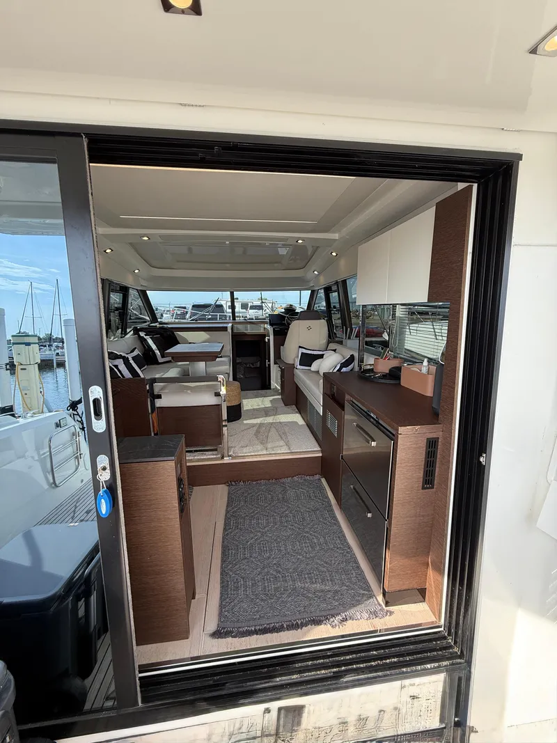 Slide: The Image of Interior view of a 2020 Prestige 420S yacht, featuring modern design and luxurious amenities. - 29