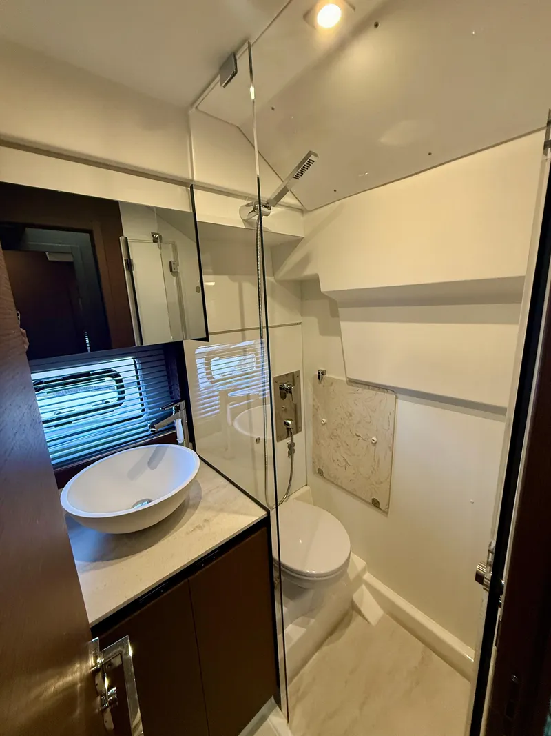 Slide: The Image of Luxurious bathroom in 2020 Prestige 420S yacht with modern fixtures and elegant design. - 30
