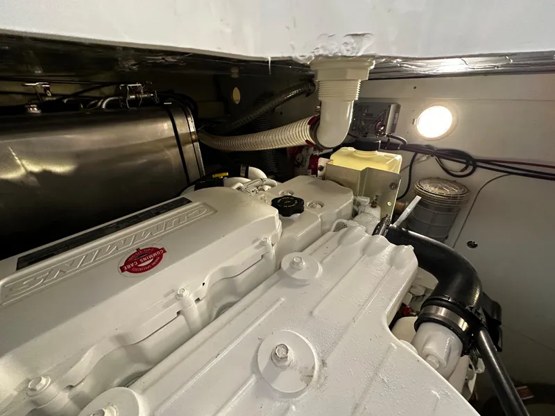 Slide: The Image of Engine compartment of a 2020 Prestige 420S yacht, showcasing mechanical components and lighting. - 40