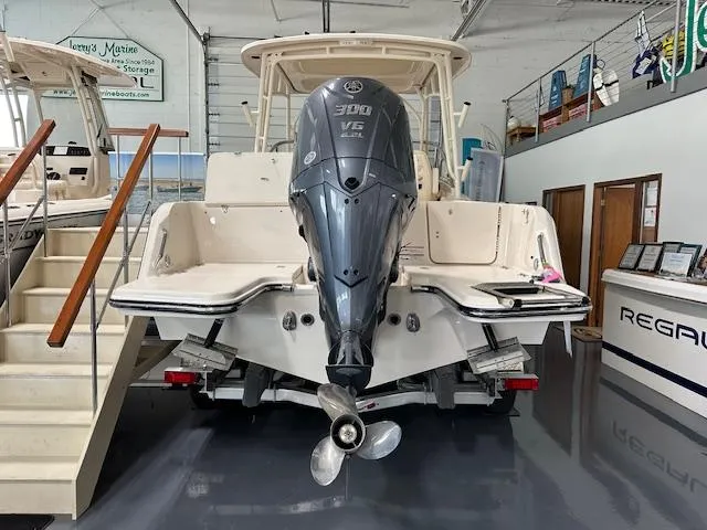 Slide: The Image of 2024 Grady-White Freedom 235 boat with Yamaha V6 engine in showroom. - 10
