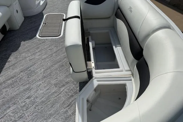 Slide: The Image of 2023 JC Neptoon 23 TT Sport boat interior with open storage compartments. - 21