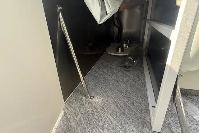 Slide: The Image of Interior view of 2023 JC Neptoon 23 TT Sport, showcasing under-seat storage area. - 26