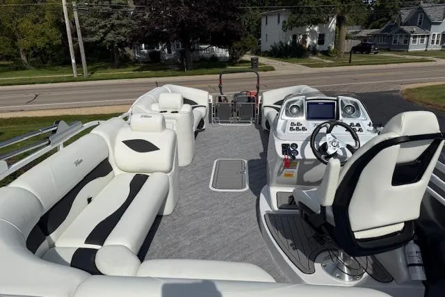 Slide: The Image of 2023 JC Neptoon 23 TT Sport pontoon boat interior with modern helm and seating. - 6