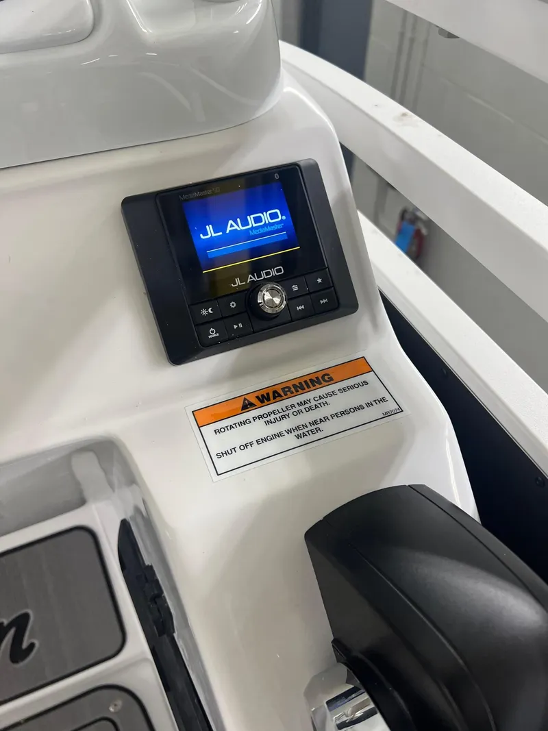 Slide: The Image of Control panel of 2023 JC Neptoon 23 TT Sport with JL Audio system. - 11