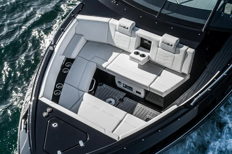 Slide: The Image of 2025 Cruisers Yachts 34 GLS luxury seating area on water. - 12