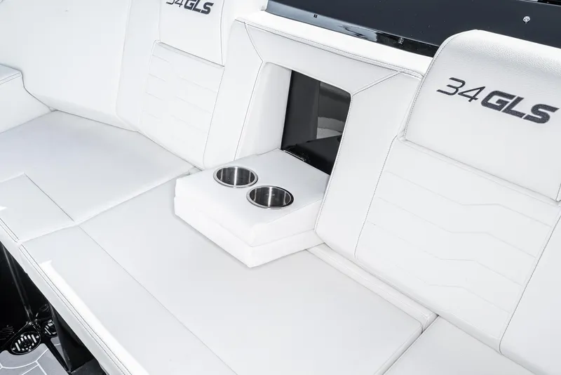 Slide: The Image of 2025 Cruisers Yachts 34 GLS interior seating with cup holders. - 13