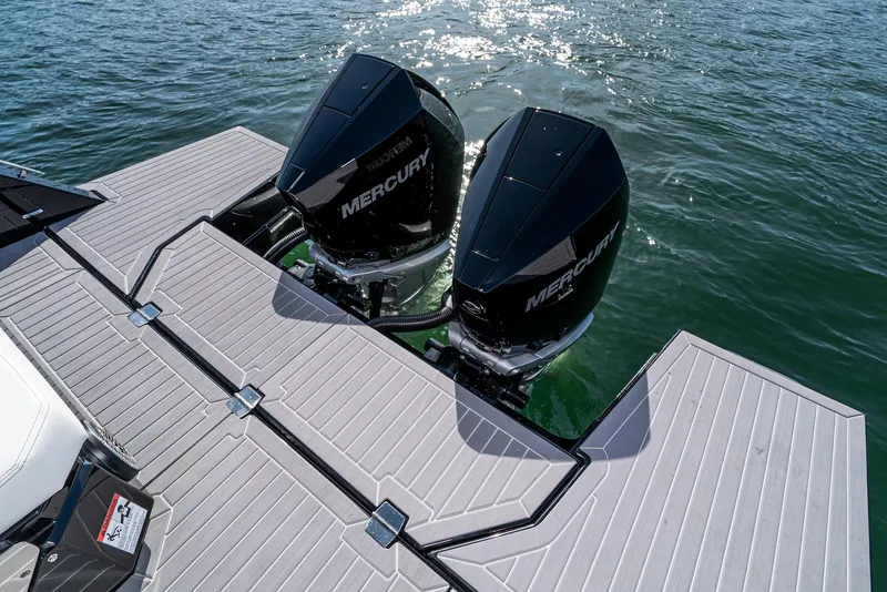 Slide: The Image of 2025 Cruisers Yachts 34 GLS with dual Mercury outboard engines on water. - 15