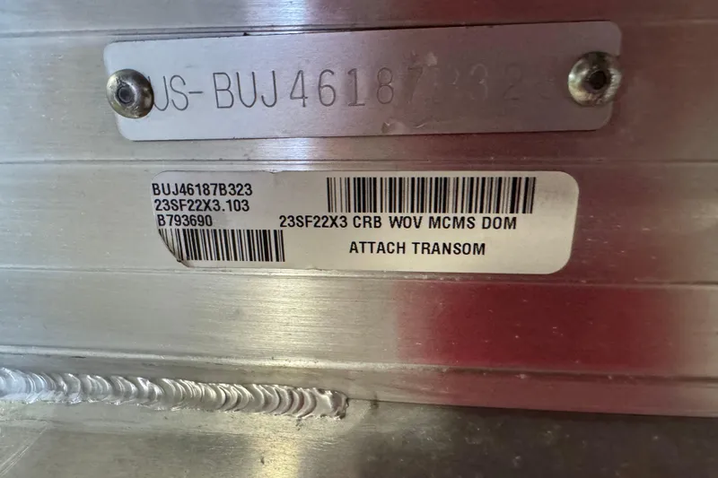 Slide: The Image of 2023 Sun Tracker SportFish 22 XP3 identification plate with serial and barcode details. - 6