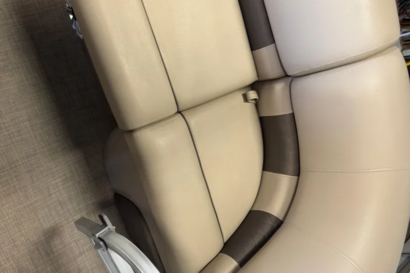 Slide: The Image of 2023 Sun Tracker SportFish 22 XP3 boat seating, beige and brown upholstery. - 8