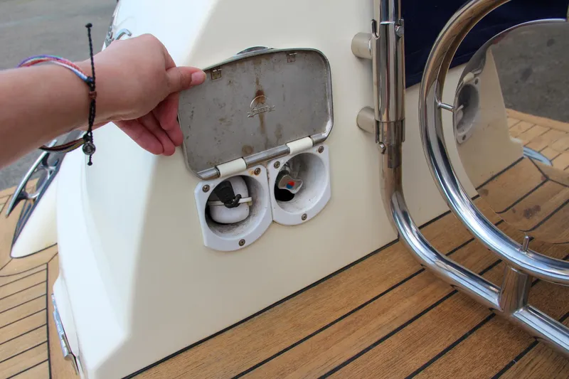 Slide: The Image of 2017 Chris-Craft Launch 36 fuel and water fill ports on teak deck. - 19