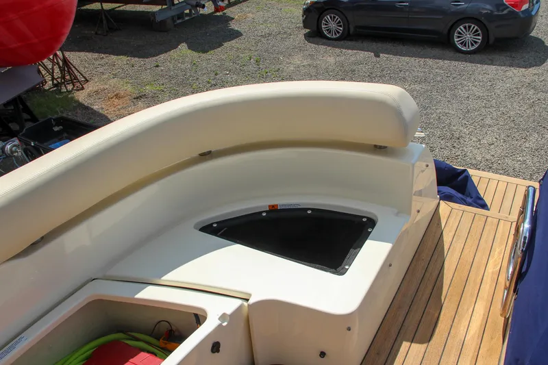 Slide: The Image of 2017 Chris-Craft Launch 36 boat seating and storage compartments. - 25