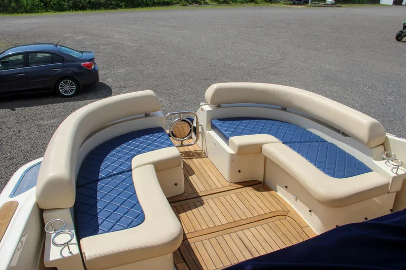 Slide: The Image of 2017 Chris-Craft Launch 36 boat with spacious seating and wooden deck. - 30