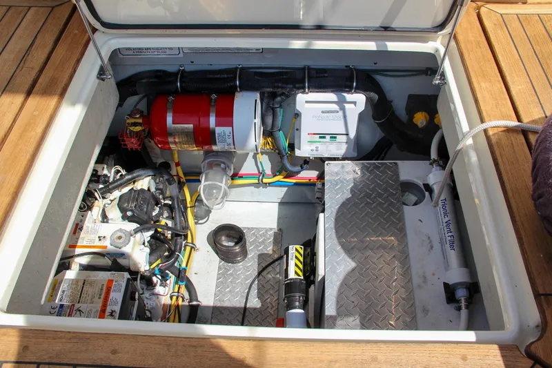 Slide: The Image of 2017 Chris-Craft Launch 36 engine compartment with various mechanical components. - 31