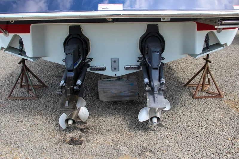 Slide: The Image of 2017 Chris-Craft Launch 36 boat stern with dual propellers on stands. - 4