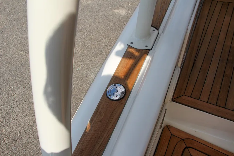 Slide: The Image of 2017 Chris-Craft Launch 36 deck with wood accents and metal fixture. - 41