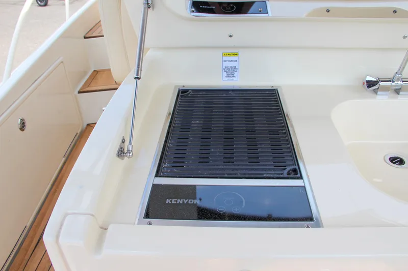 Slide: The Image of 2017 Chris-Craft Launch 36 boat with Kenyon grill and sink in cockpit. - 44