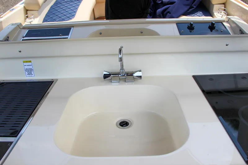 Slide: The Image of 2017 Chris-Craft Launch 36 boat sink and countertop area. - 45