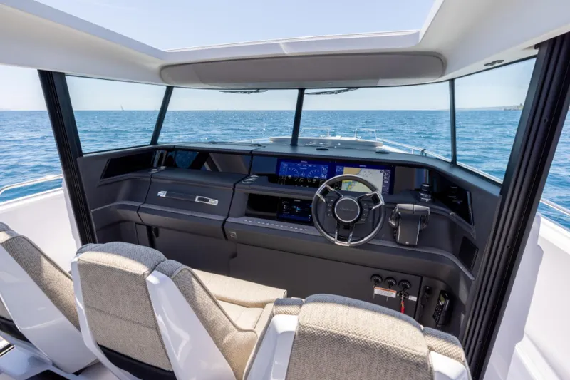 Slide: The Image of Interior cockpit of 2024 Axopar 45 boat with modern navigation system. - 6