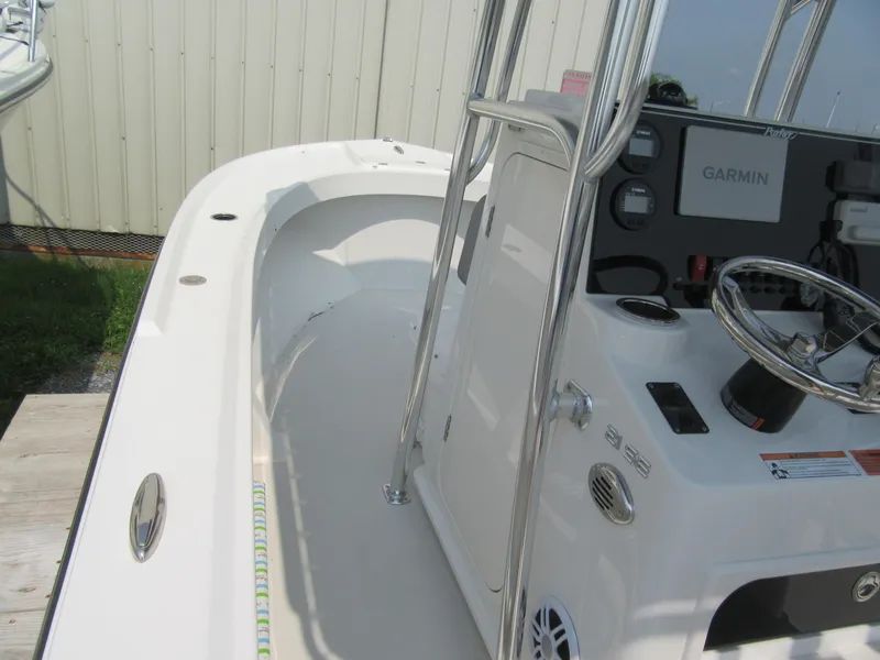 Slide: The Image of 2024 Parker 2100 Special Edition boat interior with Garmin navigation system. - 4