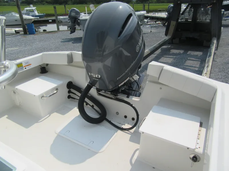 Slide: The Image of 2024 Parker 2100 Special Edition boat with Yamaha 150 outboard motor. - 5