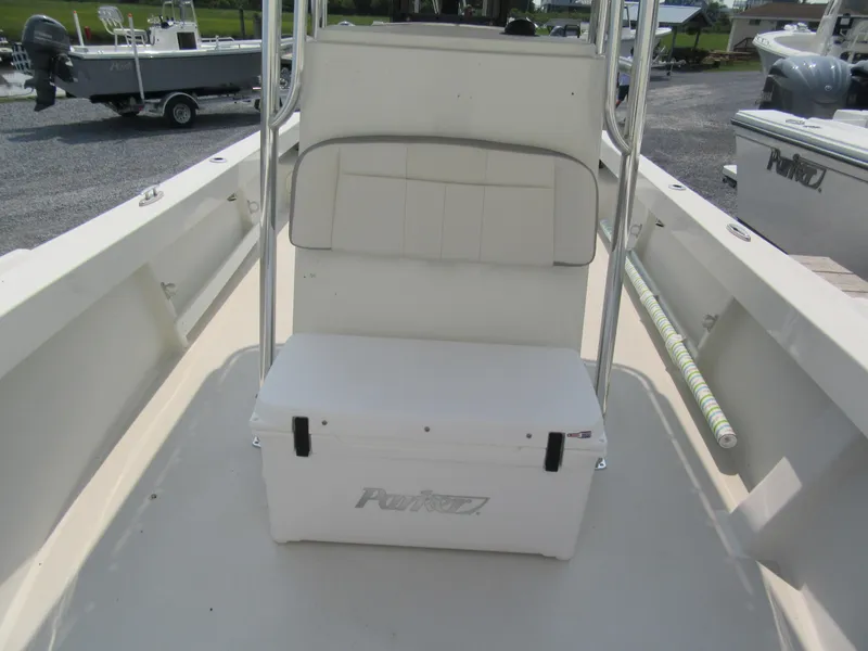 Slide: The Image of 2024 Parker 2100 Special Edition boat interior with seating and storage. - 6