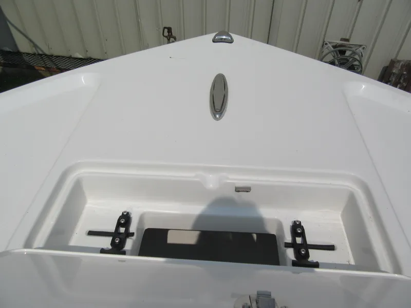 Slide: The Image of 2024 Parker 2100 Special Edition boat bow storage compartment. - 8