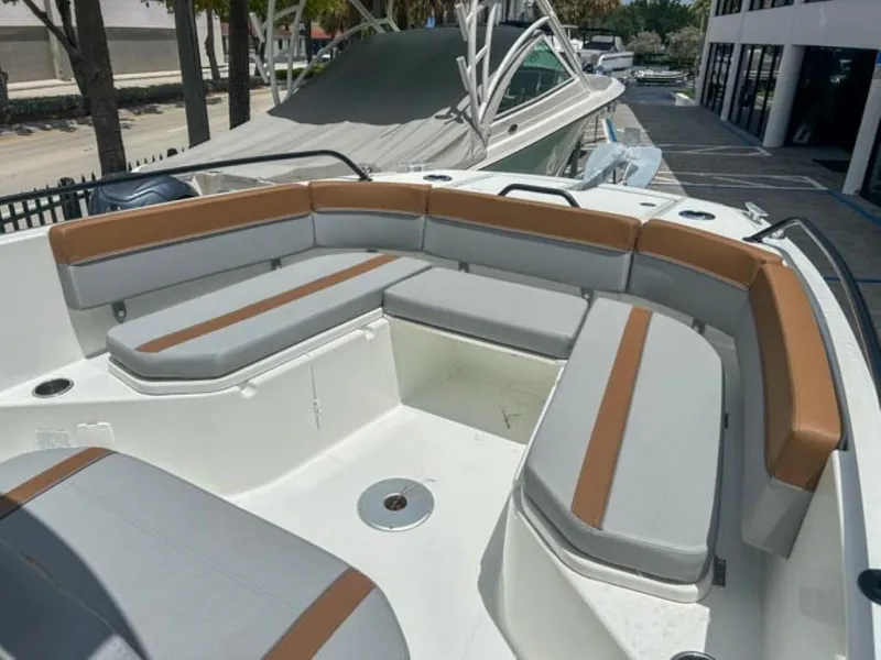 Slide: The Image of 2024 Beneteau Flyer 8 SPACEdeck boat with spacious seating area and modern design. - 4