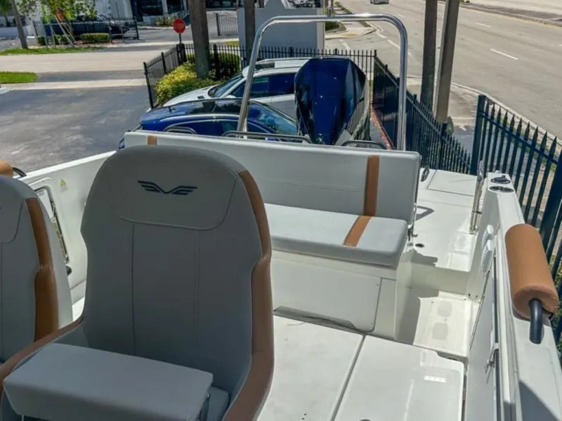 Slide: The Image of 2024 Beneteau Flyer 8 SPACEdeck boat interior with seating and helm. - 8