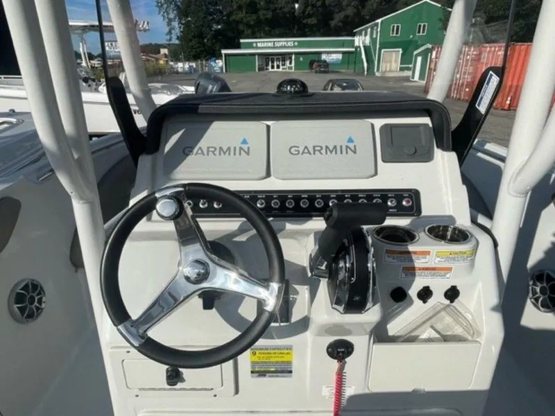 Slide: The Image of 2024 Finseeker 210 FS boat console with Garmin navigation system. - 4