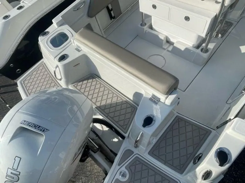 Slide: The Image of 2024 Finseeker 210 FS boat interior with Mercury 150 outboard motor. - 5