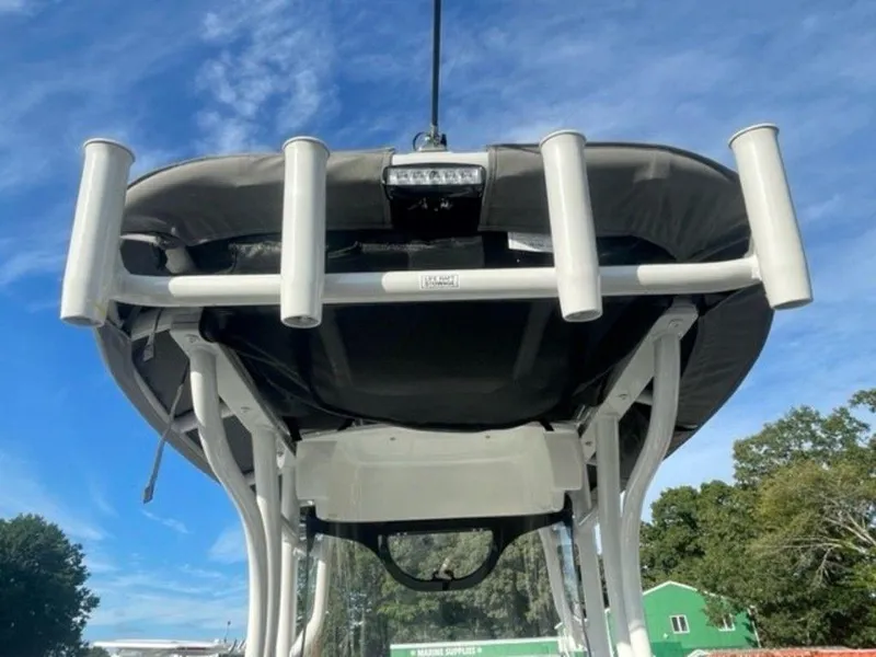 Slide: The Image of 2024 Finseeker 210 FS boat with rod holders and canopy. - 7